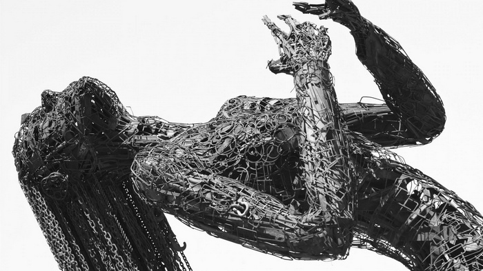 Psychedelic metal sculpture of a woman