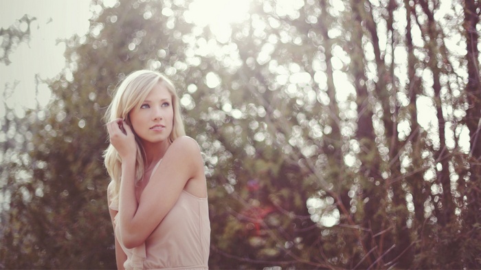 Berit Birkeland in a sunlit forest