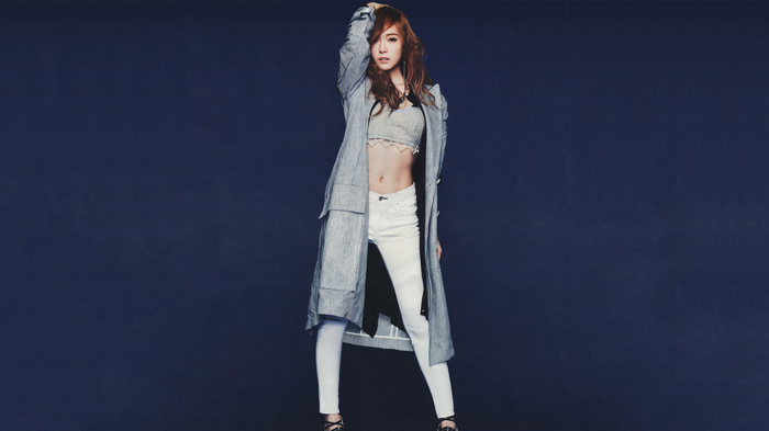 Jessica Jung in a gray coat and white pants