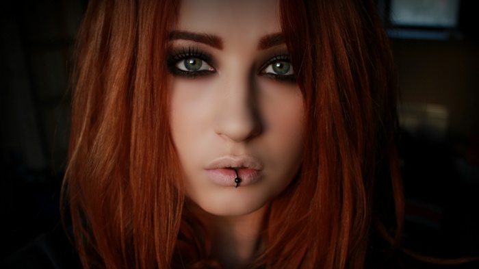 Niky Von Macabre with a lip ring and smoky eyes