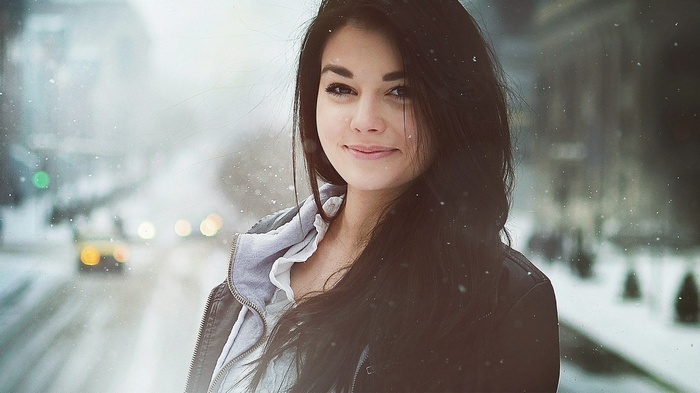 Woman smiling in the snow