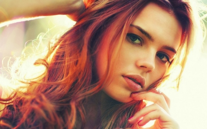 Redhead woman with painted nails