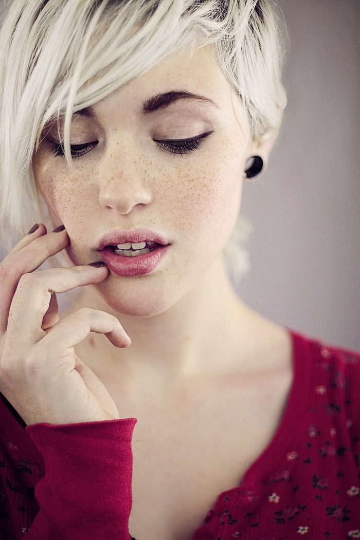 Devon Jade with blonde hair and freckles