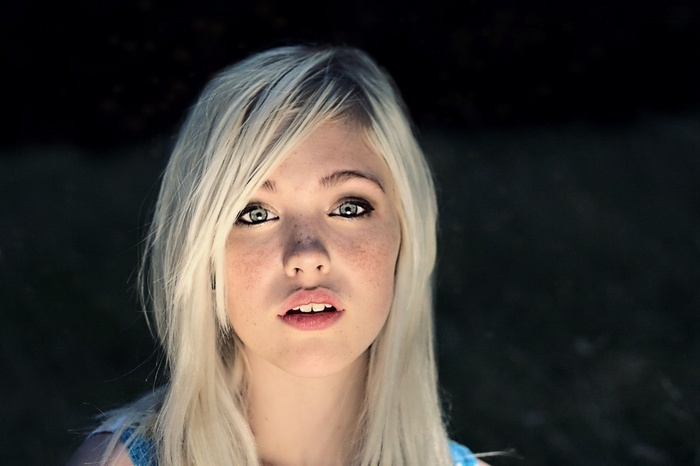 Devon Jade with blonde hair and freckles