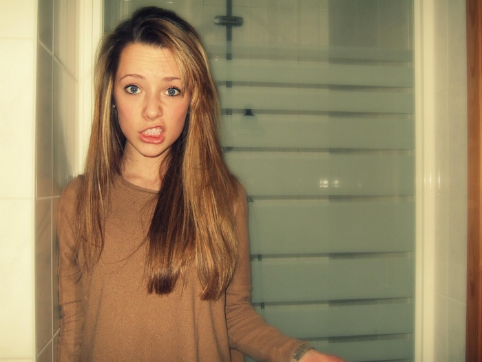 Young woman with long hair and blue eyes