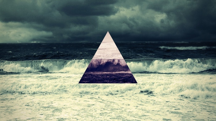 Triangle overlay on stormy sea waves