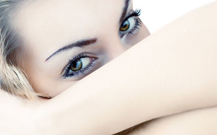 Woman's face with makeup and eyes