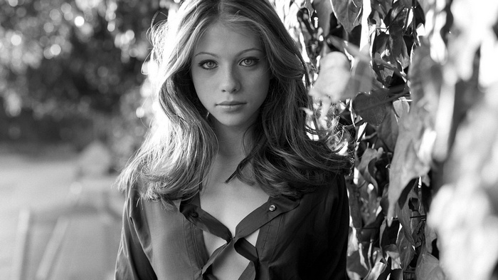 Michelle Trachtenberg in a black shirt outdoors