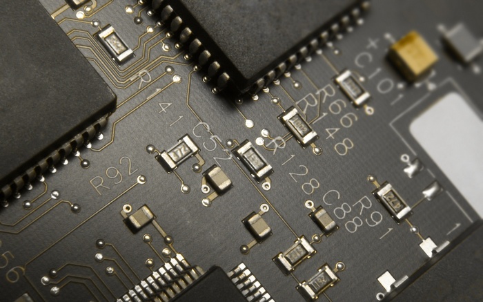 Close-up of a complex electronic circuit board with chips and components