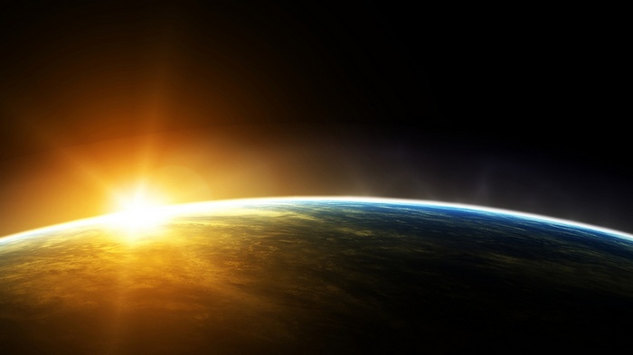 Earth and Sun from space at sunset