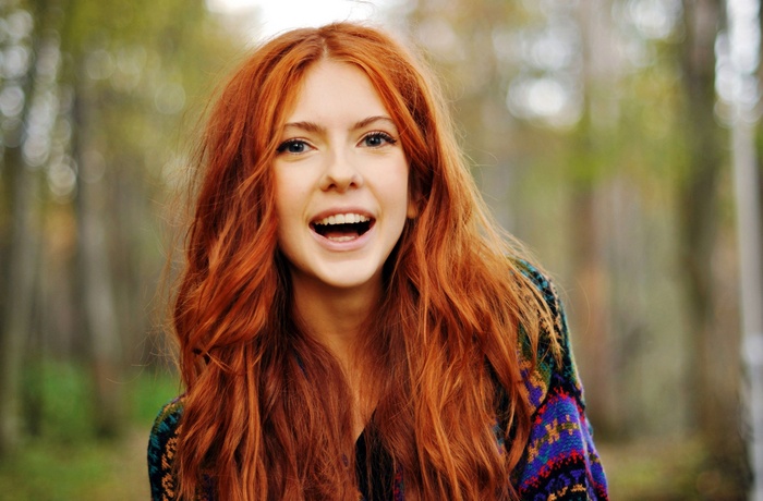 Redhead Ebba Zingmark with long hair outdoors