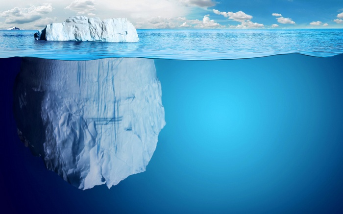 Split view of an iceberg in the sea
