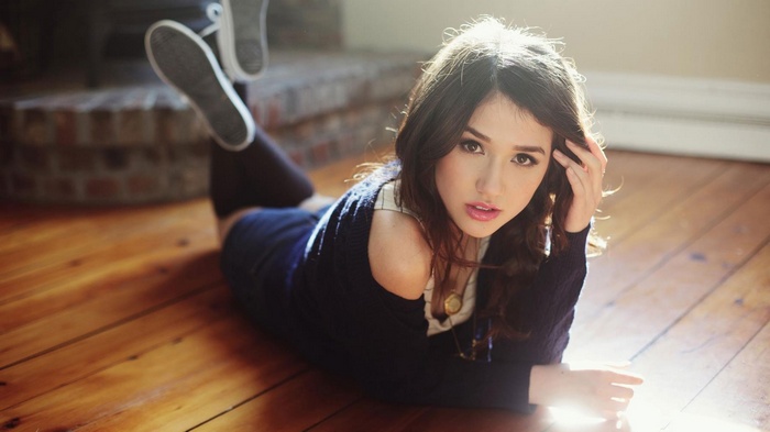 Anne Winterson lying on a wooden floor