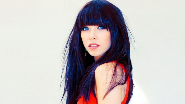 Carly Rae Jepsen with dark hair and blue eyes