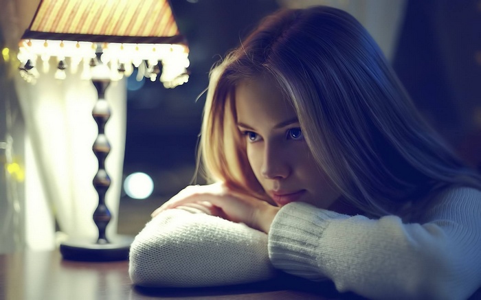 Ksenia Morozova with blonde hair and blue eyes