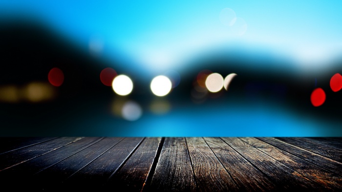 Bokeh lights over a wooden table