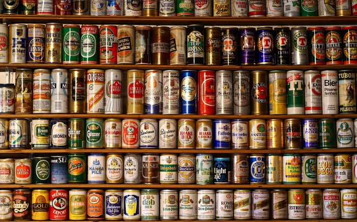 Shelves filled with various beer cans