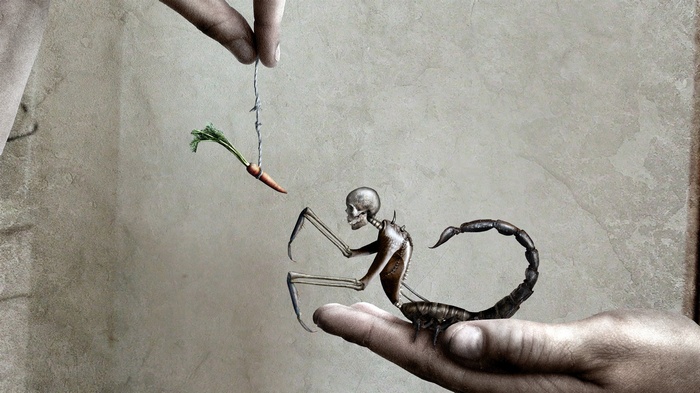 Scorpion skeleton reaching for a carrot