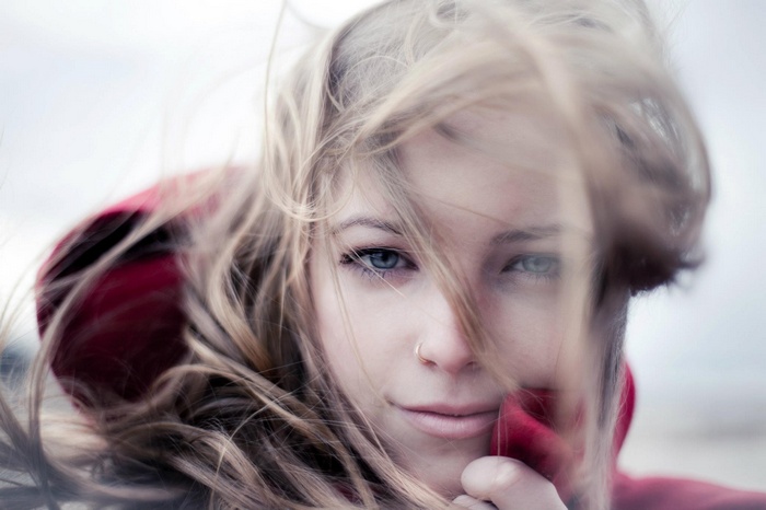 Young woman with blonde hair and blue eyes