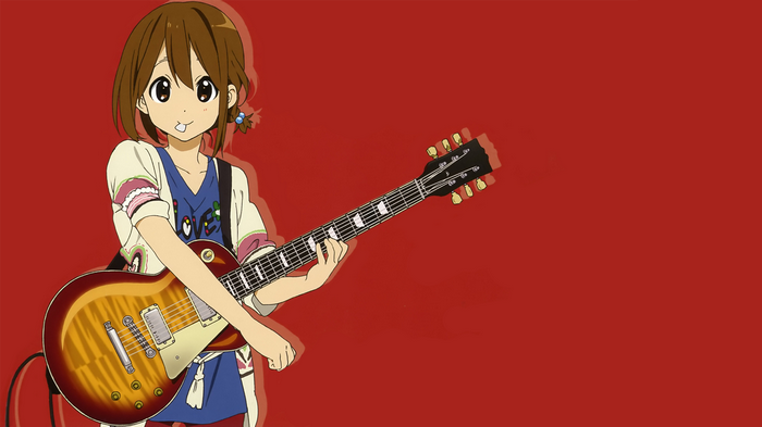 Hirasawa Yui playing guitar in K-ON!