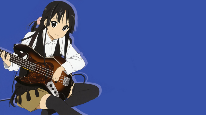 Akiyama Mio playing bass guitar in K-ON!