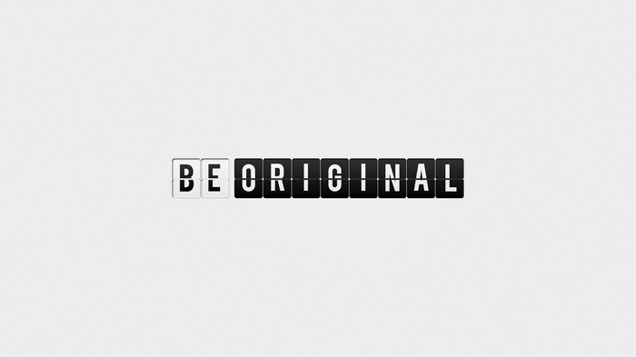 Flip-disc display spelling "BE ORIGINAL"