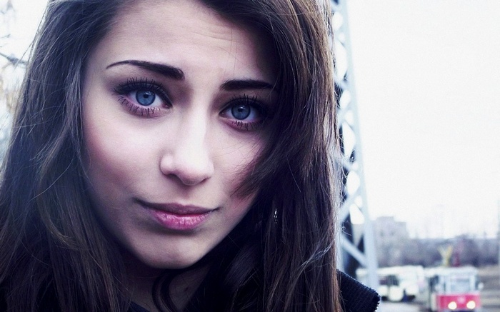 Woman with blue eyes outdoors