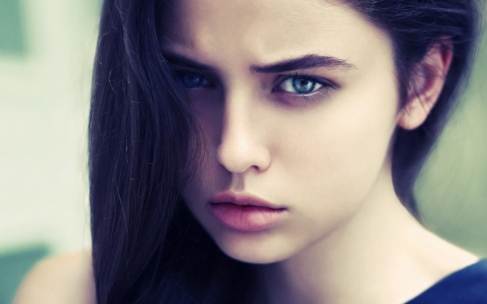 Portrait of a young woman with blue eyes