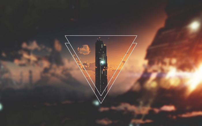 Futuristic skyscraper within geometric shapes against a sunset sky