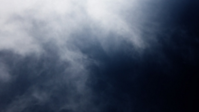 Dark clouds and mist in the sky