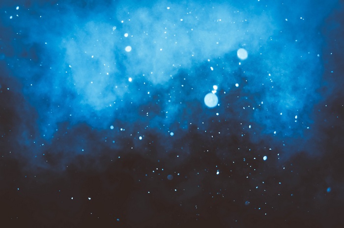 Blue mist with bokeh and particles