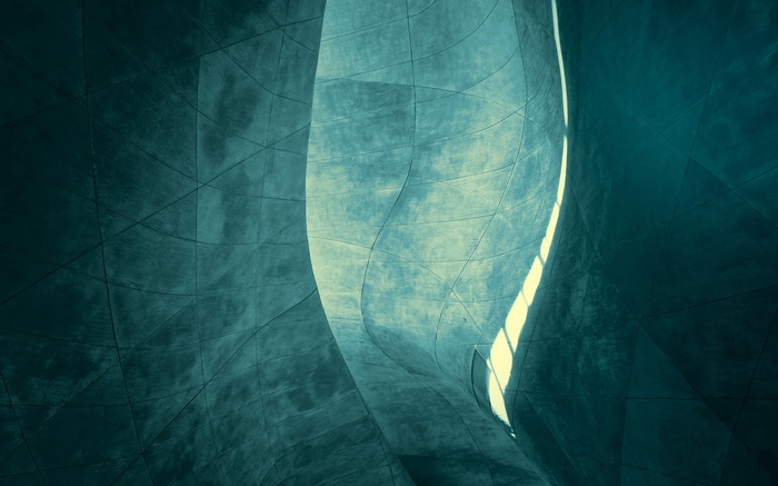 Abstract architecture with curved concrete walls and light