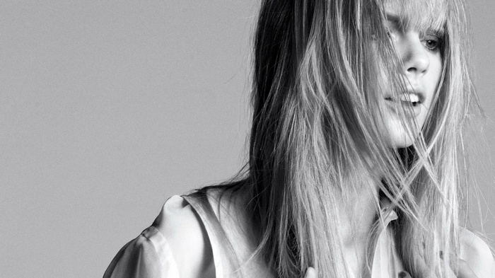 Taylor Swift monochrome portrait with windswept hair