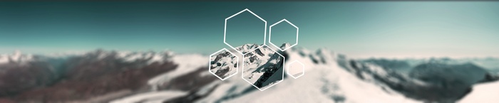 Hexagons overlaying a blurred mountain landscape