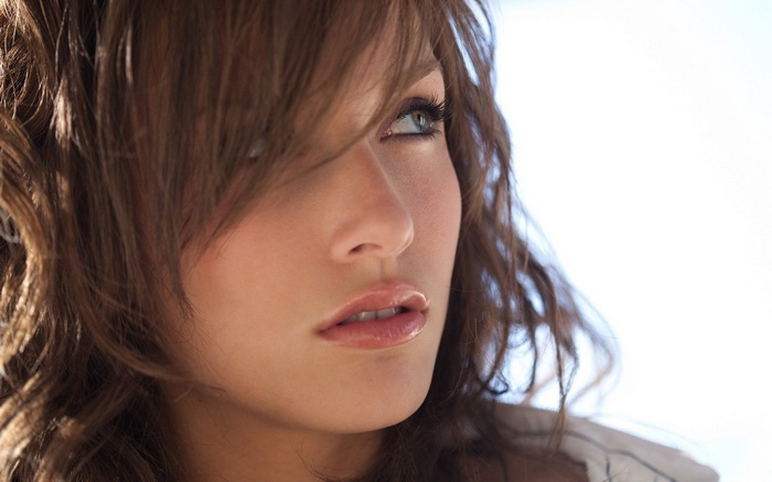 Malena Morgan with brown hair and green eyes
