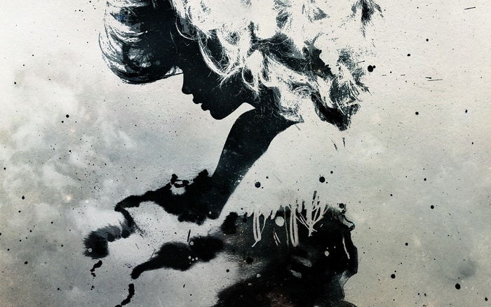 Abstract silhouette of a woman with paint splatter
