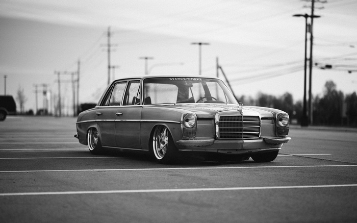 Modified Mercedes-Benz sedan with Stanceworks sticker