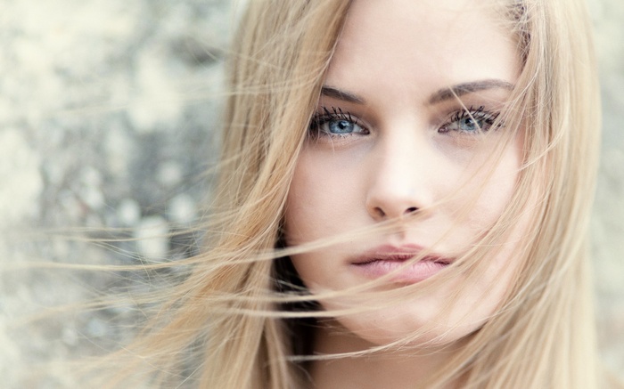 Portrait of a blonde woman with blue eyes