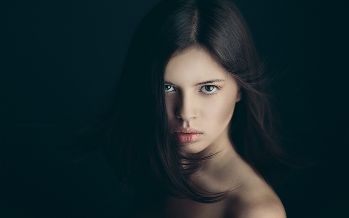 Portrait of a young woman with dark hair