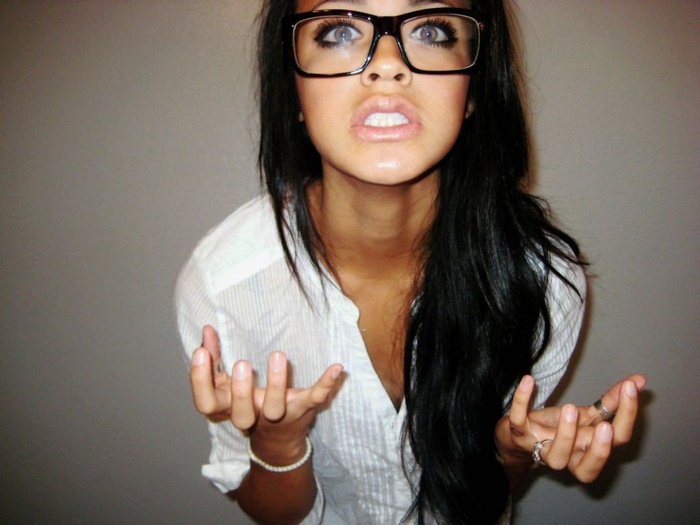 Woman with glasses and black hair