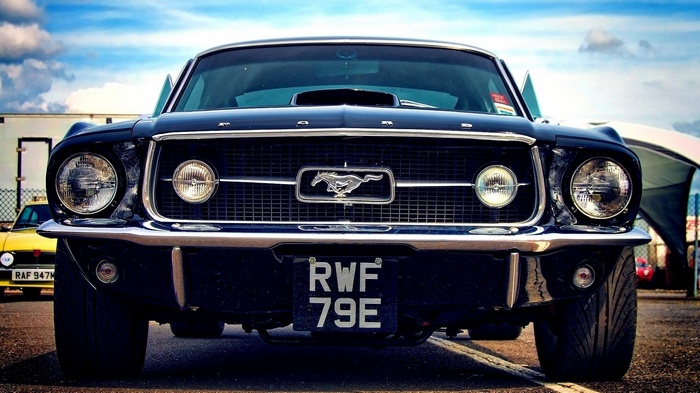 Black Ford Mustang with license plate RWF 79E