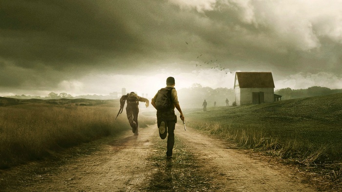 DayZ: Survivors running from zombies in a field