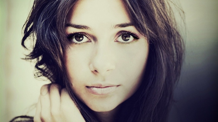 Portrait of a young woman with dark hair