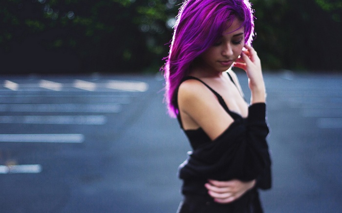 Alexis Ren with purple hair outdoors
