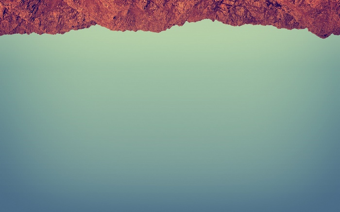 Minimalist rocky cliff edge against a gradient sky