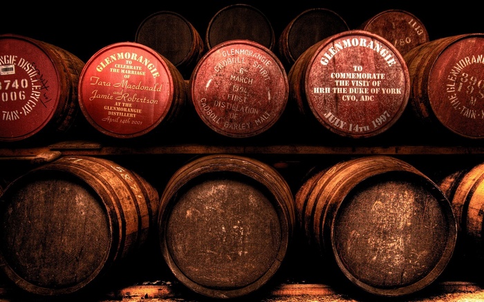 Glenmorangie distillery barrels in a cellar