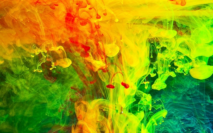Colorful abstract paint swirls in water