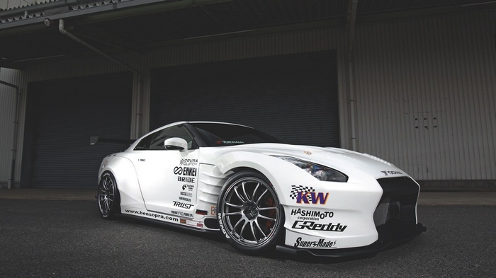 White Nissan GT-R R35 with racing decals
