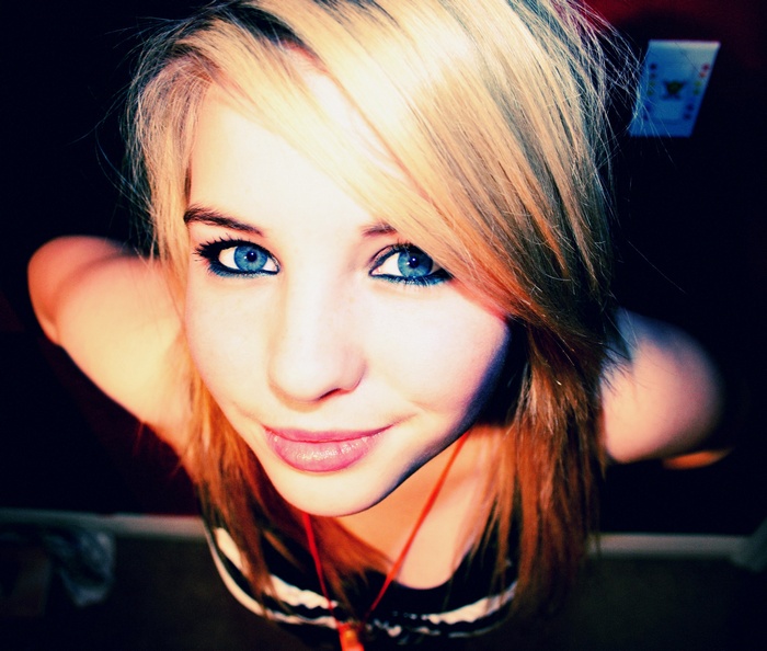 Young woman with blue eyes and blonde hair