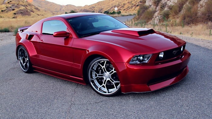 Red Ford Mustang with custom body kit